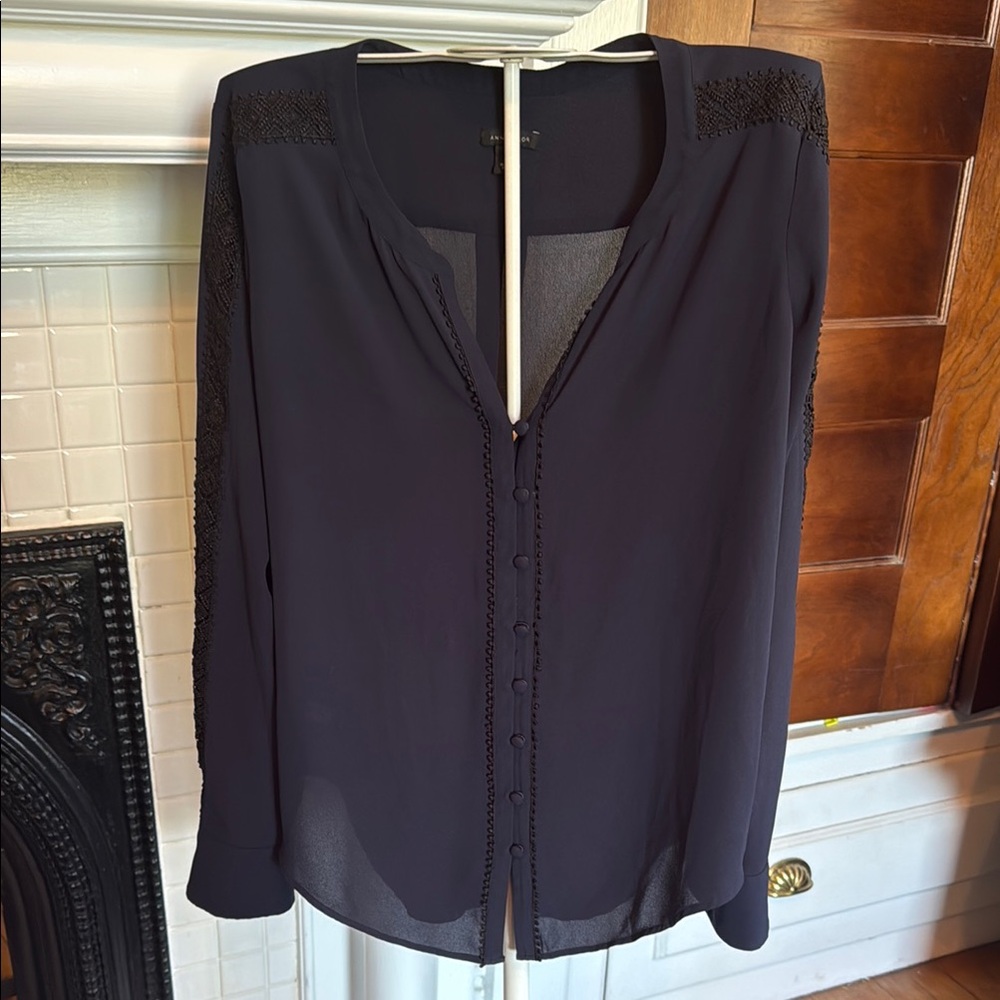 Ann Taylor Navy Long Sleeve Buttoned Blouse w/lace embellishments. Worn about 3x